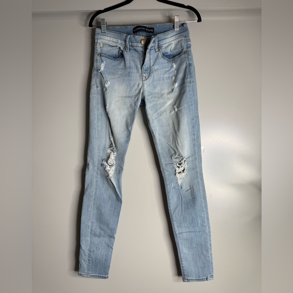 Express Women's Light Blue Distressed Jeans midrise (Size 4R)